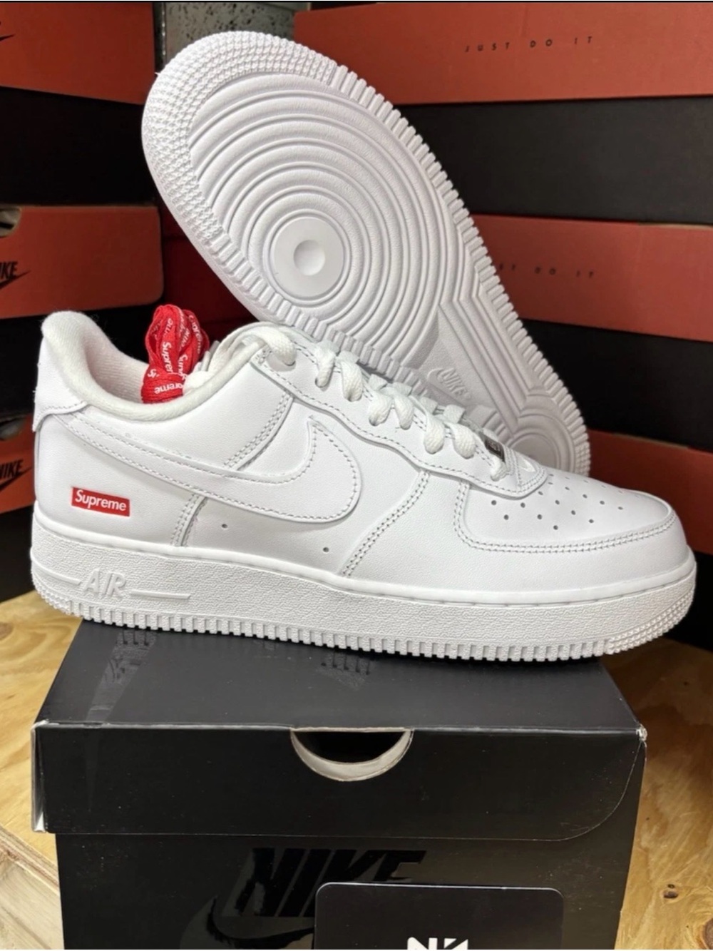 Supreme White Sneakers with Red Logo Accent